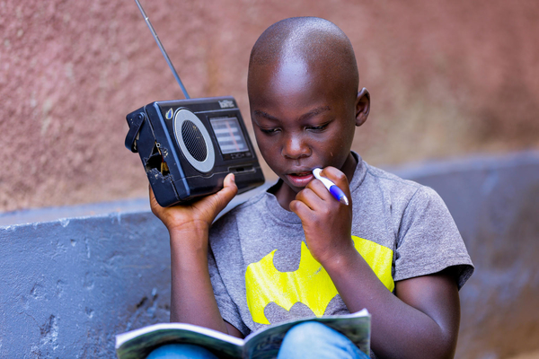young boy with radio