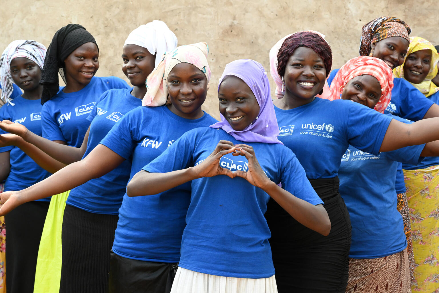 Young women organizing a meeting to discuss HIV/AIDS