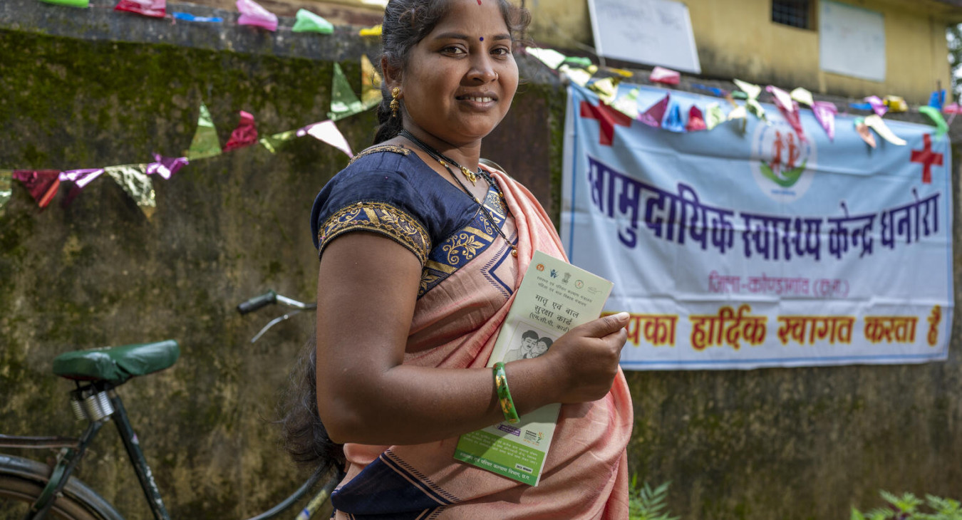 A woman poses at a community health center in Chattisgarh, India