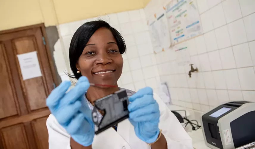 a lab technician checking at test